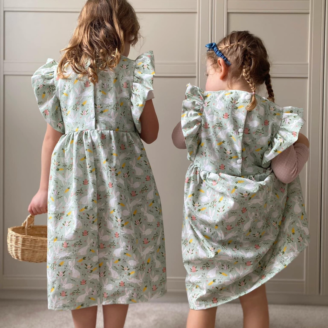 Bio Webware Stoff  -  Happy Bunnies  - PrettyLittlePigs, Tiere, Ostern, grün, 100% Bio-Baumwolle