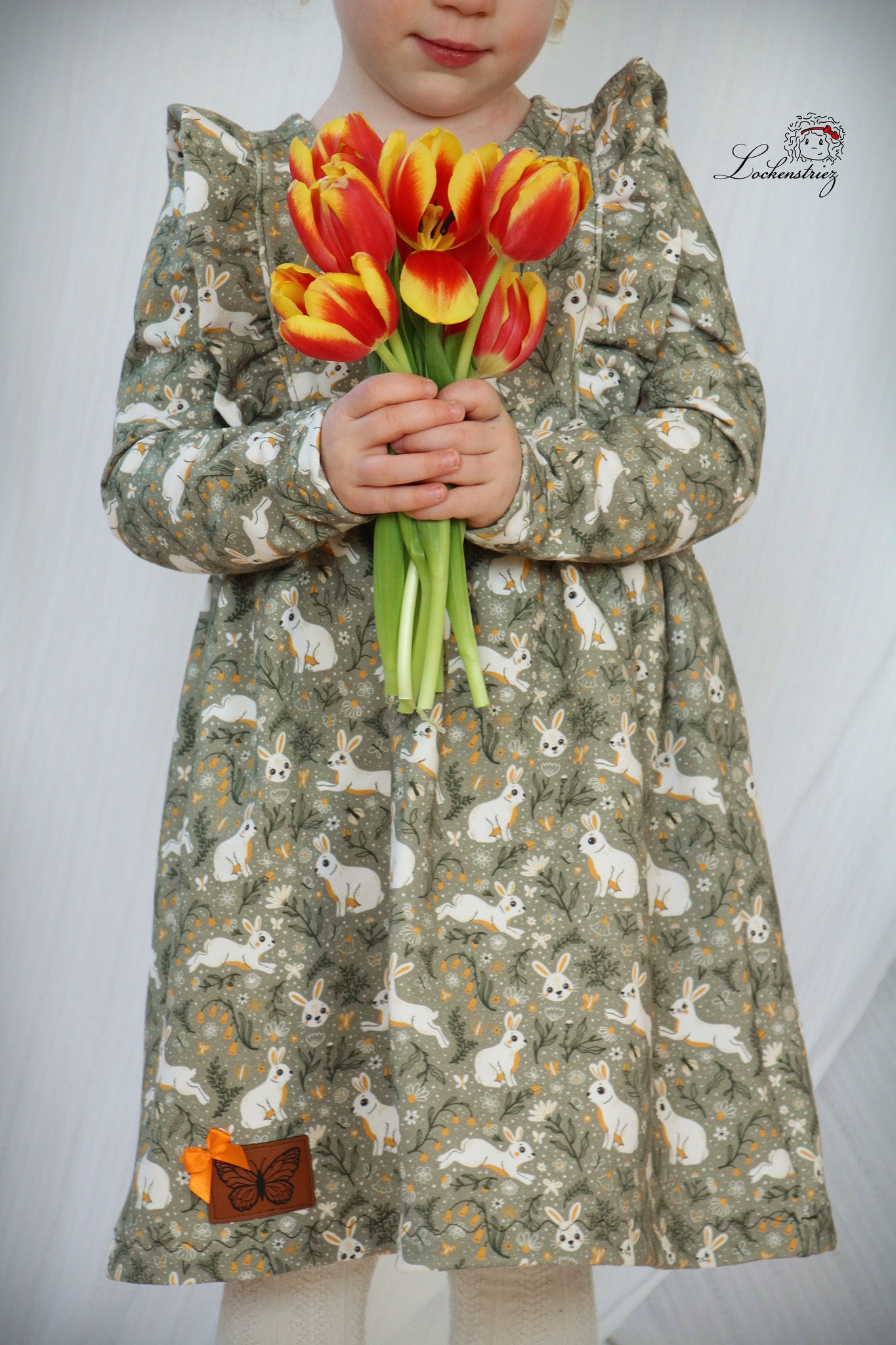 Bio Webware Stoff  -  Happy Bunnies  - PrettyLittlePigs, Tiere, Ostern, gelb, schwarz, 100% Bio-Baumwolle