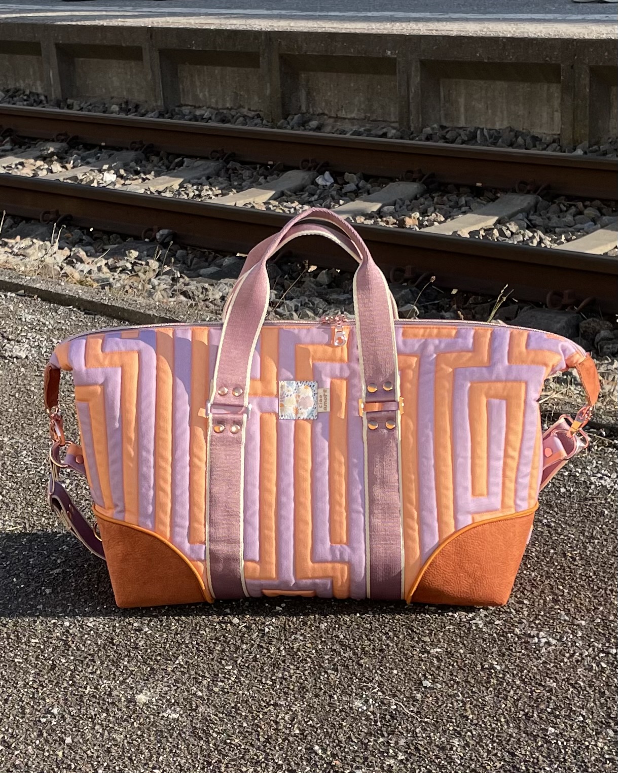 Bio Stoff - Gleichklang Horizontalstreifen flieder, koralle