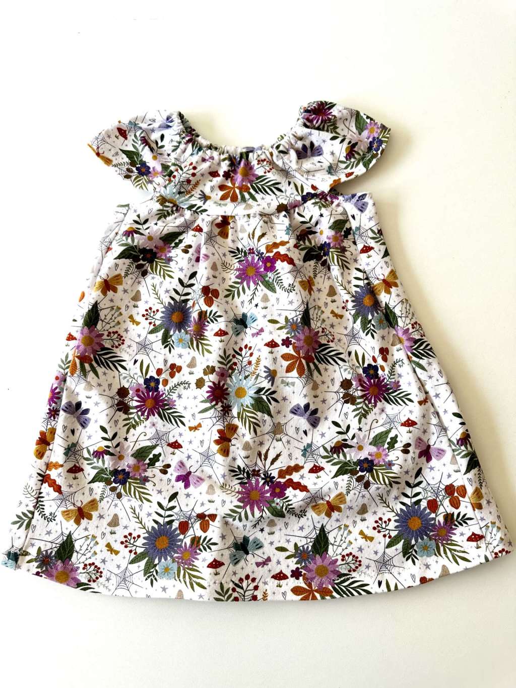 Organic Fabric - Autumn Flowers White by Deinki in white Organic Fabric - Autumn Flowers White by Deinki in white